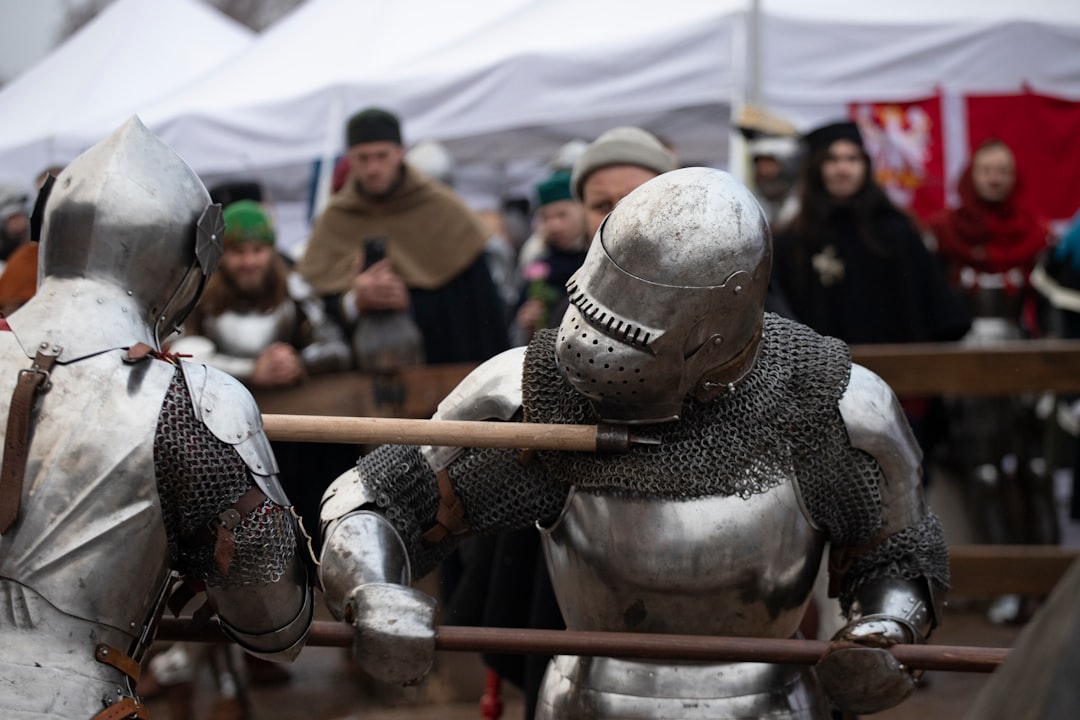 A group of men dressed in armor standing next to each other